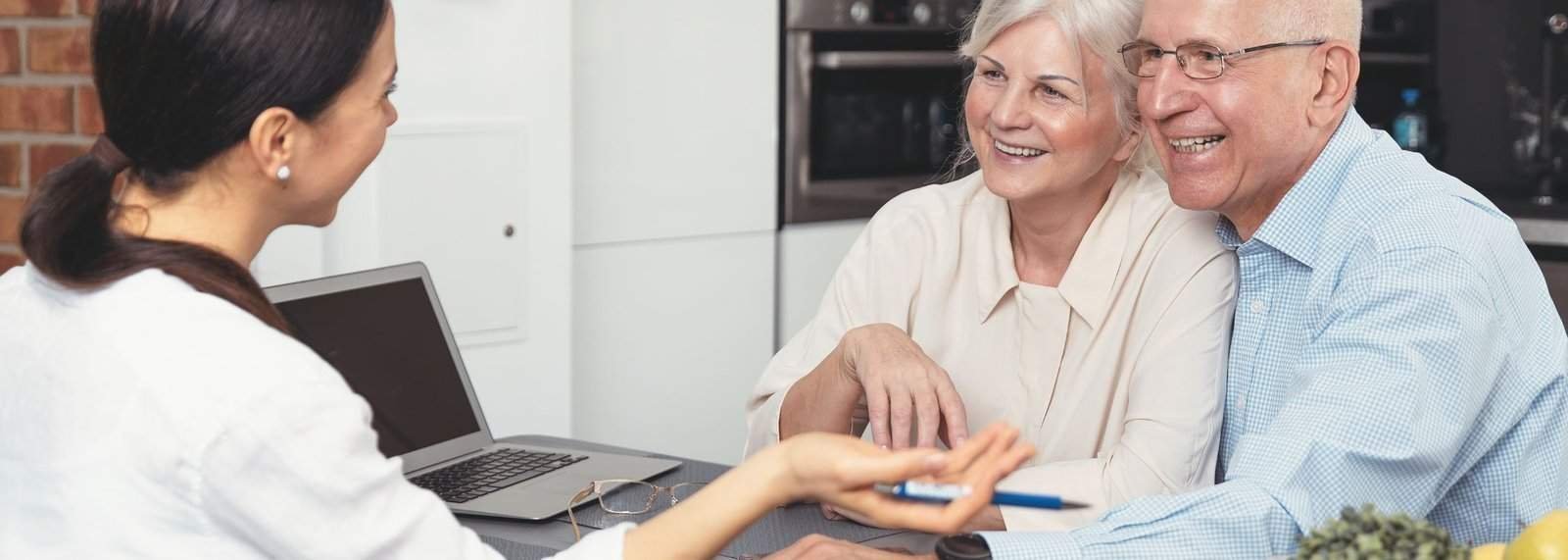 a woman smiling at a woman