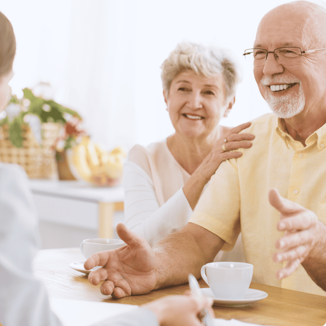 a group of people sitting at a table
